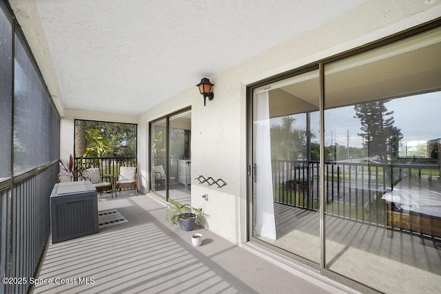 sunroom / solarium with plenty of natural light