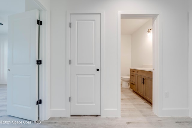 hallway featuring light wood-type flooring