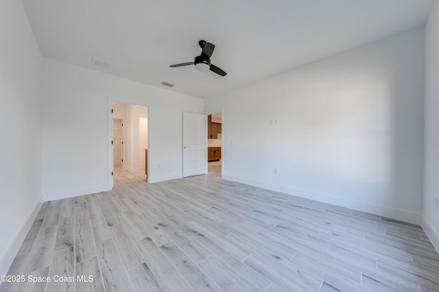 unfurnished bedroom featuring ceiling fan and light wood-type flooring