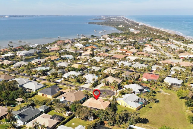 birds eye view of property featuring a water view