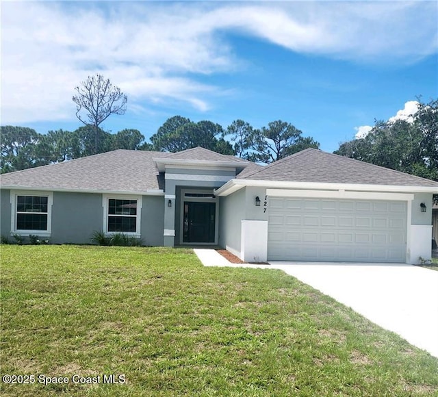 single story home featuring a front yard and a garage