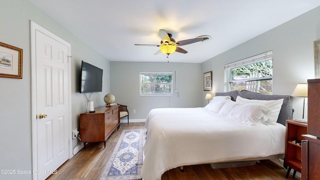 bedroom featuring ceiling fan and light hardwood / wood-style flooring