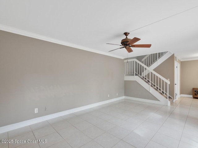 unfurnished room with ceiling fan, light tile patterned floors, and crown molding