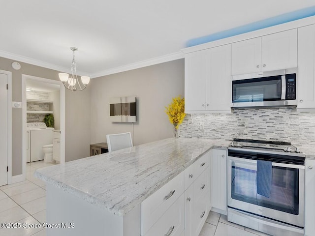 kitchen featuring kitchen peninsula, white cabinets, and stainless steel appliances