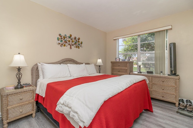 bedroom featuring hardwood / wood-style floors