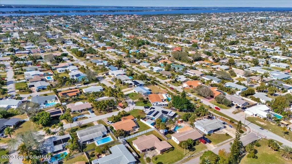 bird's eye view with a water view