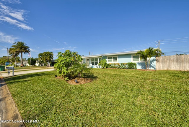 view of front of home with a front yard