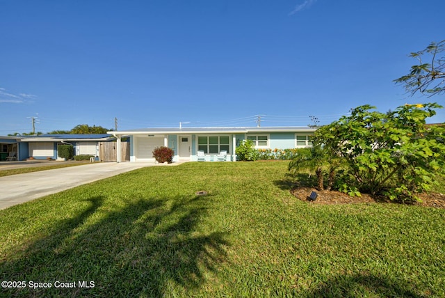 ranch-style house with a front yard and a carport