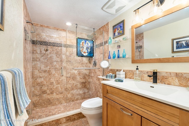 bathroom featuring tile walls, toilet, vanity, and an enclosed shower