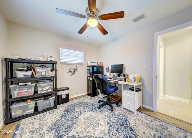 office with ceiling fan and wood-type flooring