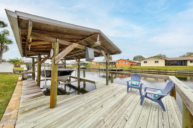 dock area with a water view