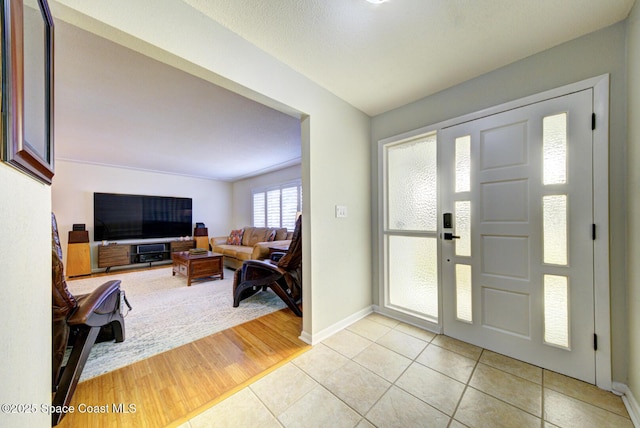 view of tiled entrance foyer