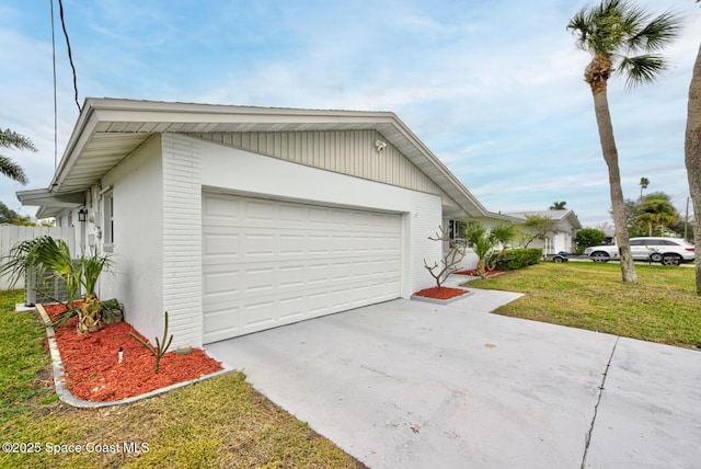 garage featuring a yard