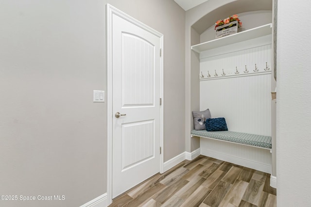 mudroom with light hardwood / wood-style floors