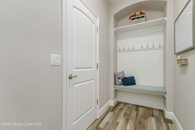 mudroom with light hardwood / wood-style floors