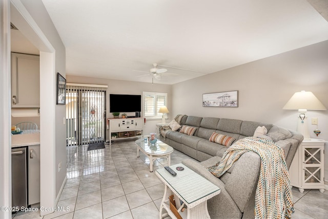 tiled living room featuring ceiling fan