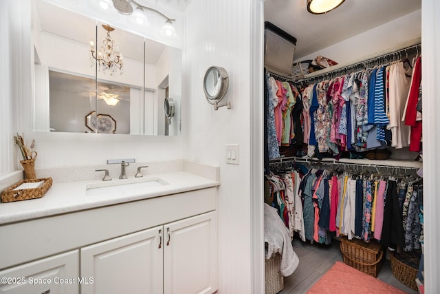 bathroom featuring vanity and hardwood / wood-style flooring