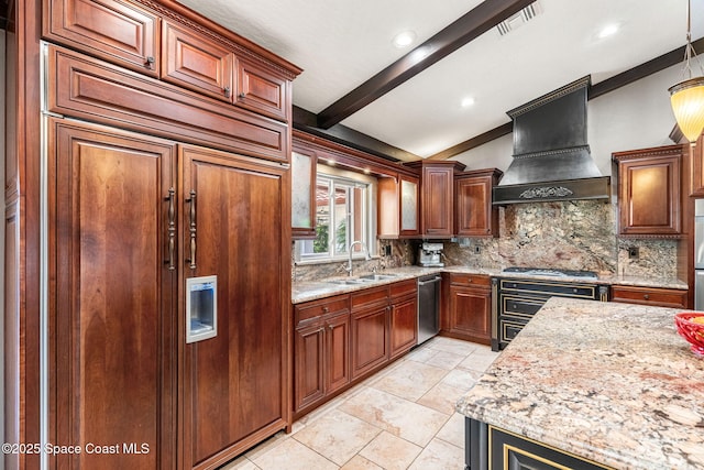 kitchen featuring custom range hood, sink, light stone counters, and decorative backsplash