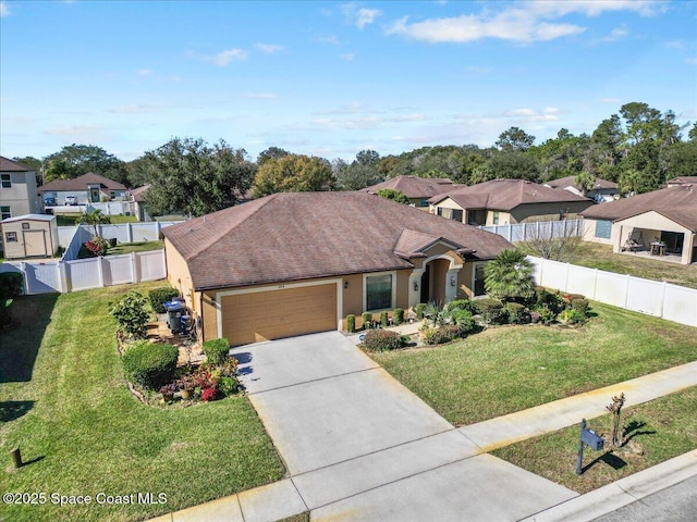 view of front facade featuring a garage and a front lawn