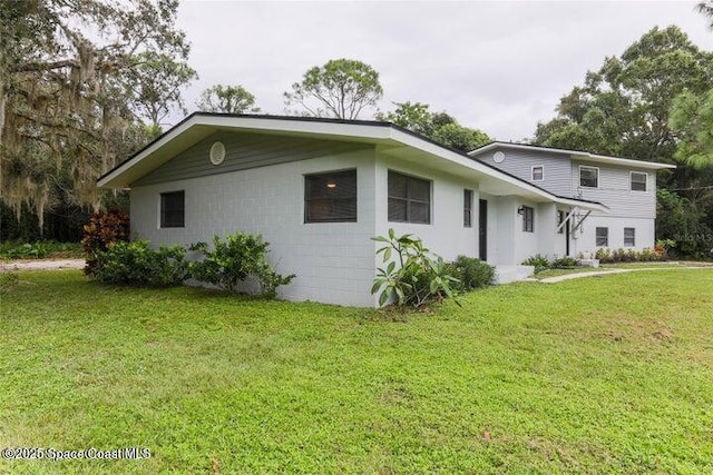 exterior space with a front lawn