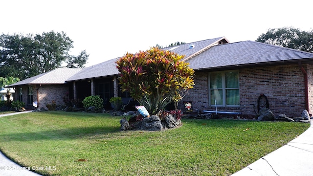 view of front of property with a front lawn