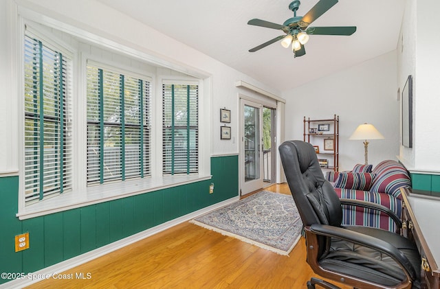 office with ceiling fan, hardwood / wood-style floors, and lofted ceiling