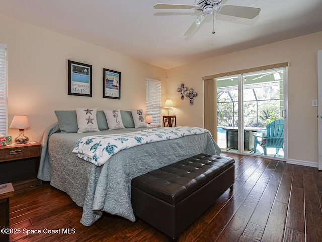 bedroom featuring ceiling fan, dark hardwood / wood-style floors, and access to outside