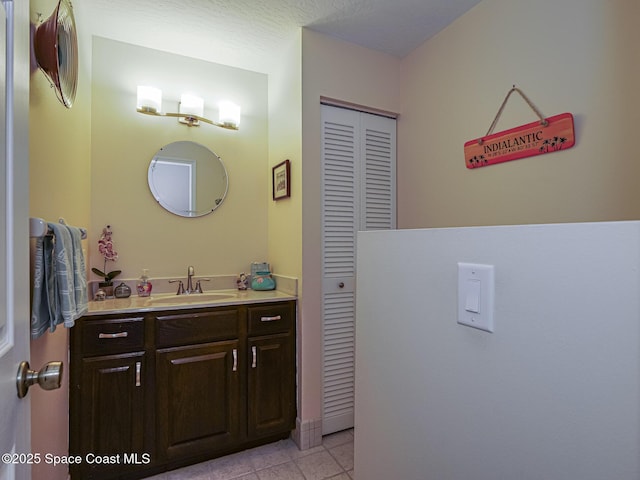 bathroom featuring vanity and tile patterned floors