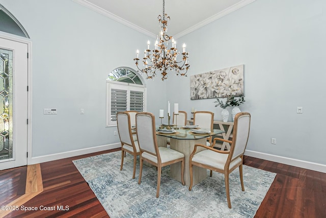 dining room with dark wood finished floors, crown molding, a healthy amount of sunlight, and baseboards