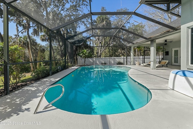 view of pool with a fenced in pool, a patio, and a lanai