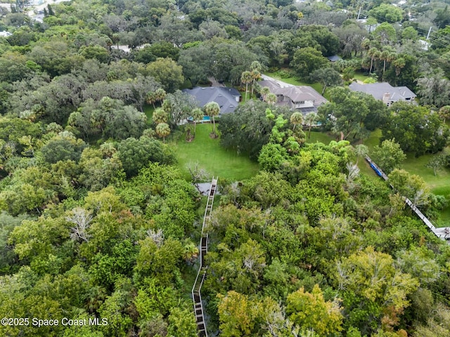 aerial view featuring a view of trees