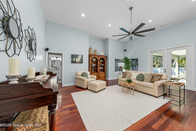 living room featuring baseboards, recessed lighting, dark wood-style flooring, ceiling fan, and french doors