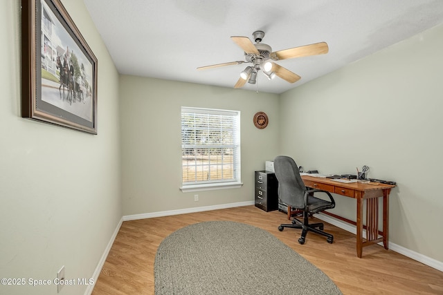 office with ceiling fan and wood-type flooring