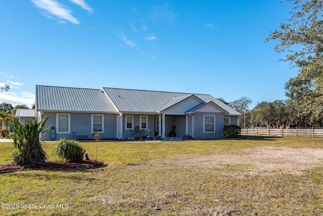 single story home with a front lawn