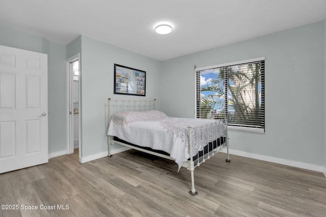 bedroom with light hardwood / wood-style floors