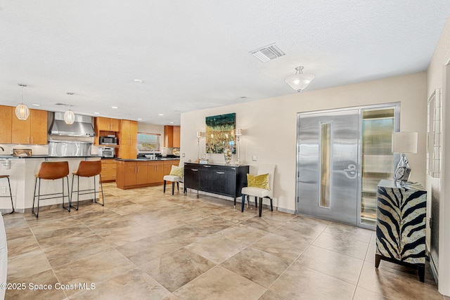 living room with a textured ceiling