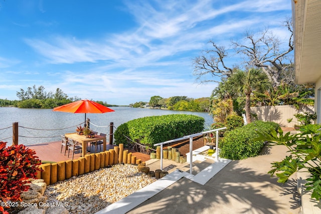 exterior space with a water view