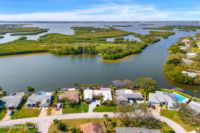 drone / aerial view featuring a water view