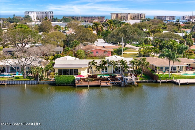 bird's eye view with a water view