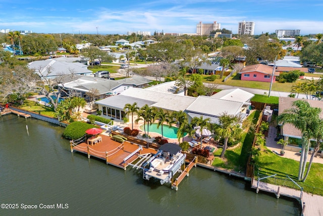 bird's eye view with a water view