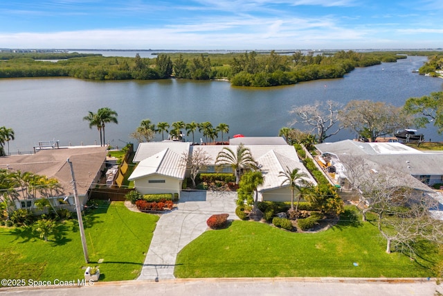 birds eye view of property featuring a water view