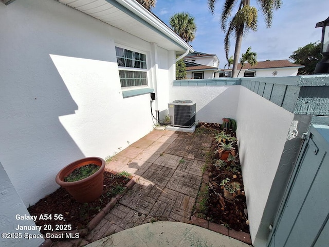 view of patio featuring central AC unit