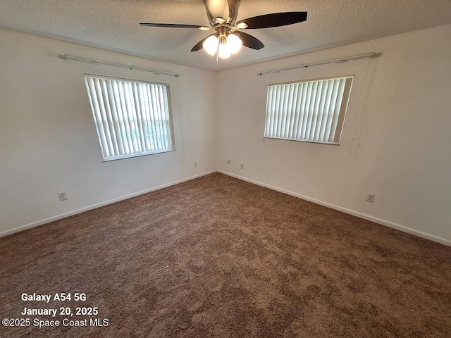 unfurnished room featuring ceiling fan, a textured ceiling, and carpet