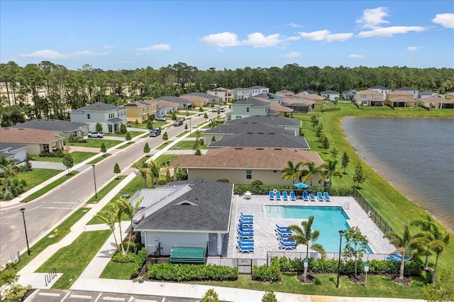 birds eye view of property featuring a water view