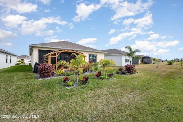 single story home with a front lawn