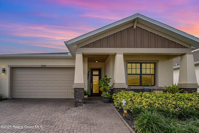 view of front of property featuring a garage