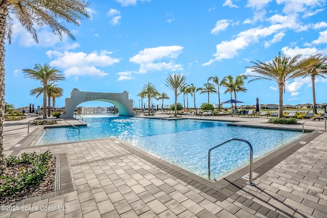 view of swimming pool with a patio area