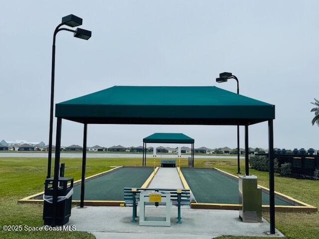 view of community with a gazebo and a lawn