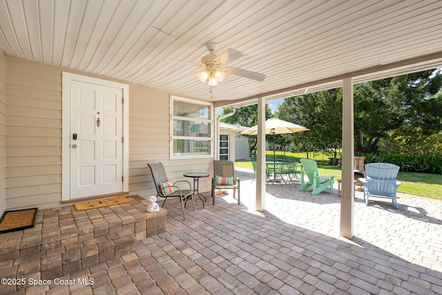 view of patio with ceiling fan