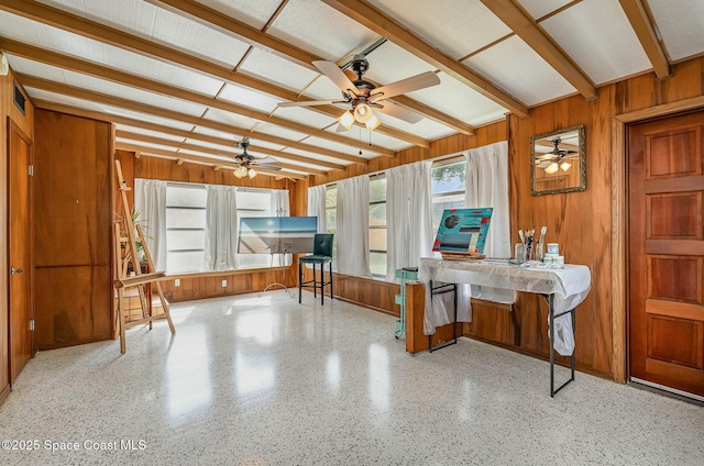 living room featuring wood walls